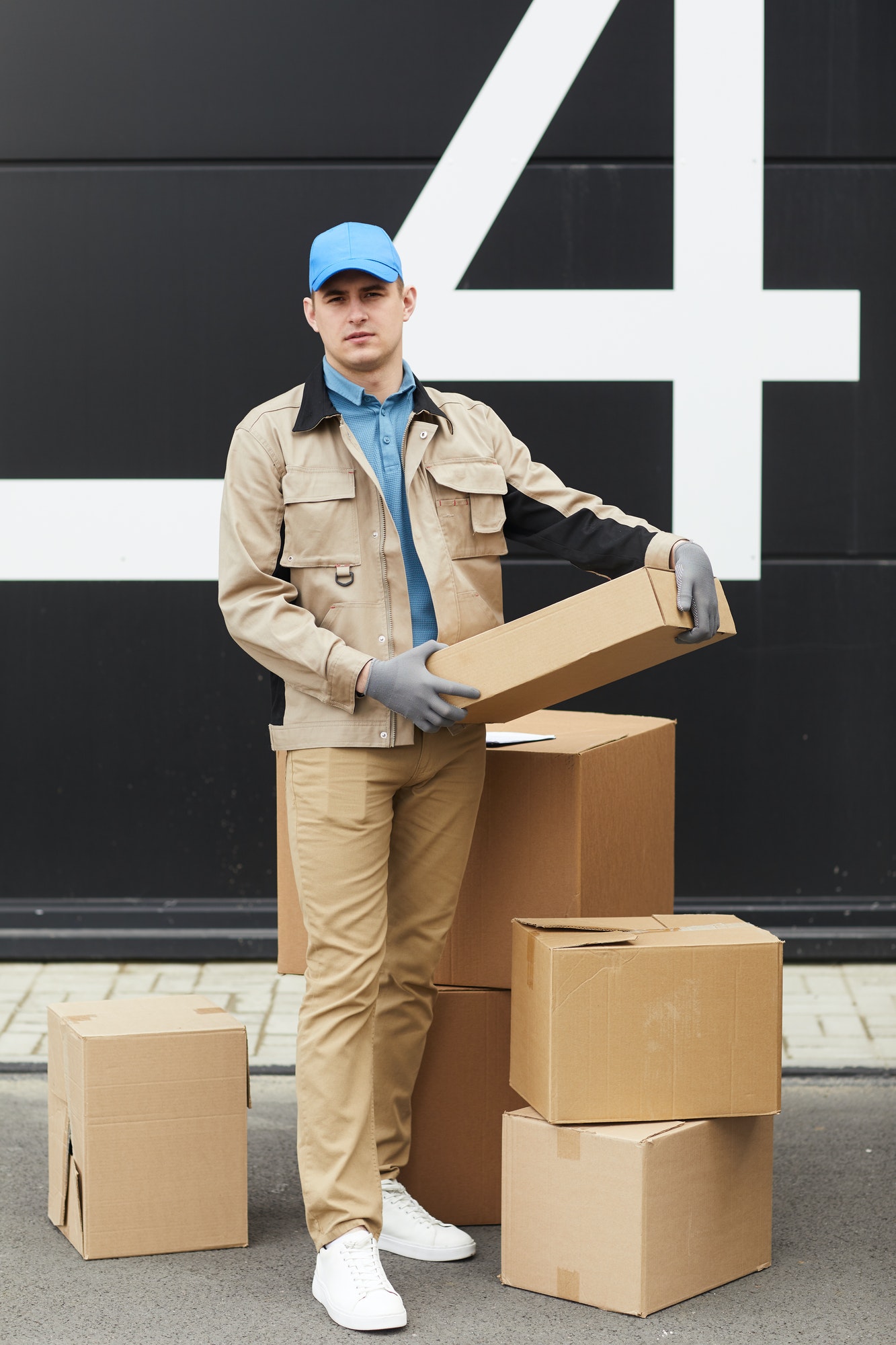 courier working with parcels in warehouse.jpg